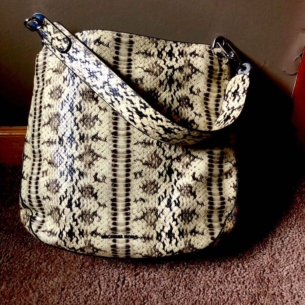 Michael Kors snakes skin bag. Never used